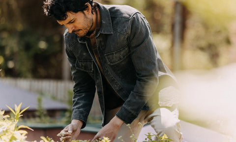 fit model posing in The Shop Shirt in Coal Chipped Canvas