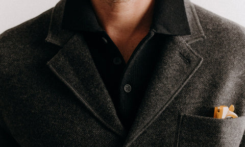 fit model posing in The Evans Blazer in Charcoal Birdseye Wool