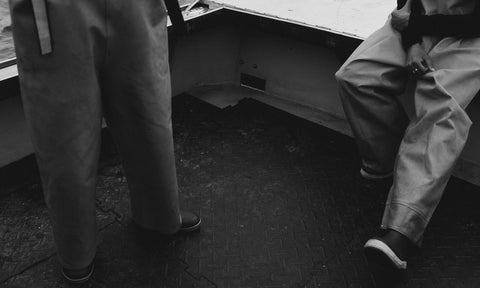 editorial image of fisherman on a boat