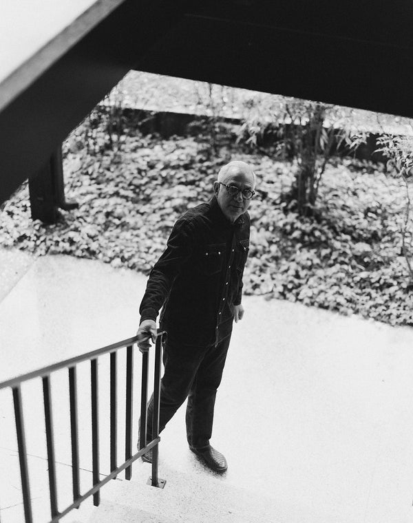 Jeff Farnsworth walking around his home