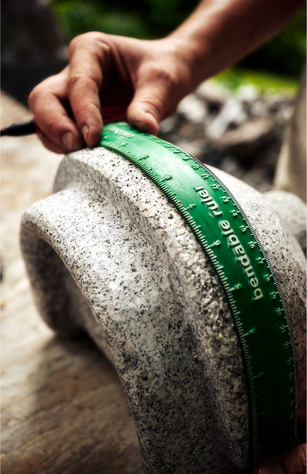 editorial image of a ruler on stone