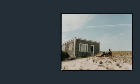 Model lounging on a chair in Wellfleet, MA