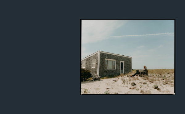 Model lounging on a chair in Wellfleet, MA