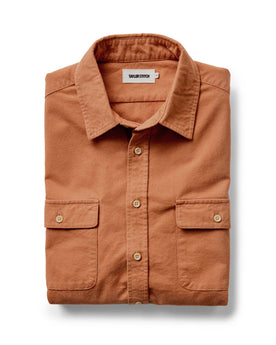 folded flatlay of The Yosemite Shirt in Summit Orange, Wovens by Taylor Stitch