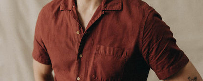 fit model posing in The Hawthorne Camp Shirt in Red Wine