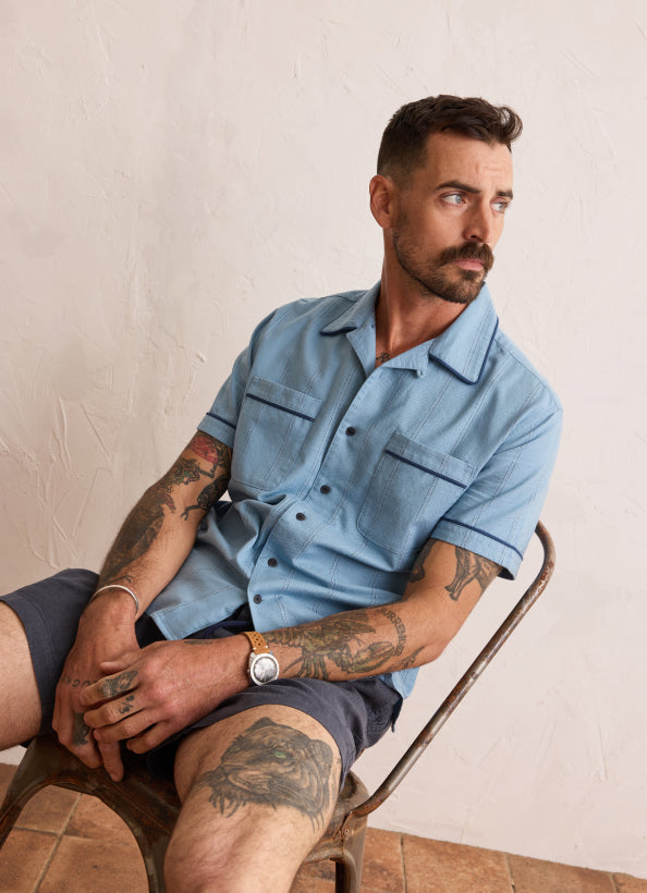 Model wearing The Tulum in Blue Sky Stripe with The Après Short in Marine Hemp