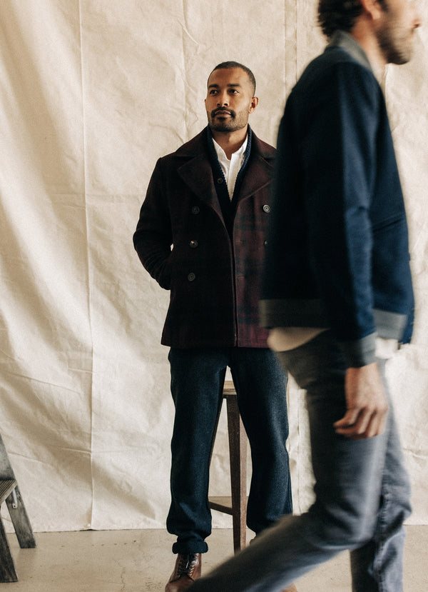 Model in the Mariner Coat in Port Plaid Wool, The Crawford Sweater and The Carnegie Pant