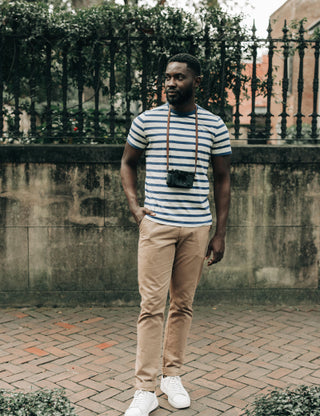 Model wearing The Foundation Pant in Organic Khaki , by Taylor Stitch