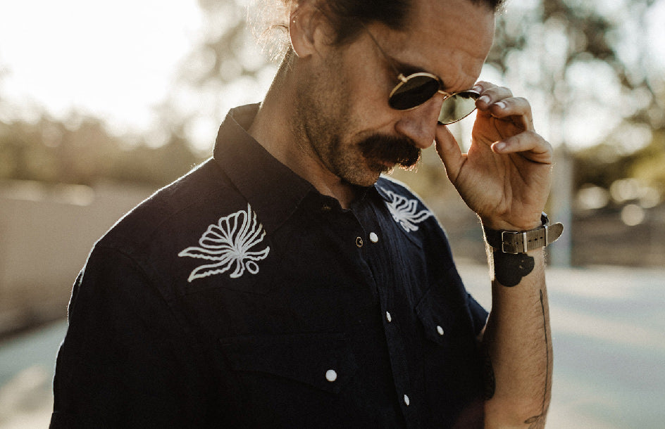 Daren Magee wearing The Embroidered Short Sleeve Western in Indigo Linen