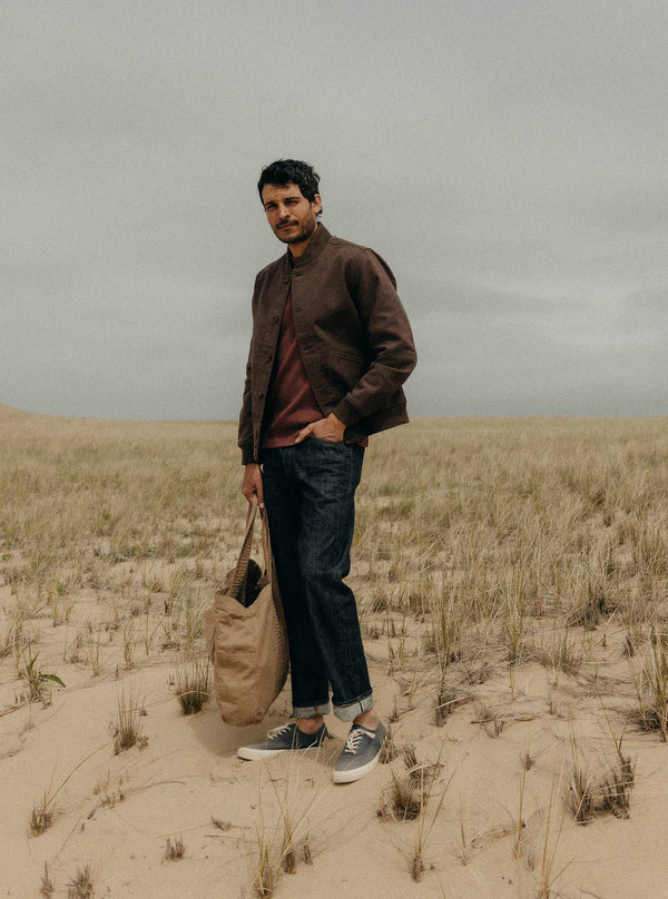 Model wearing The Clark Bomber Jacket in Soil Moleskin