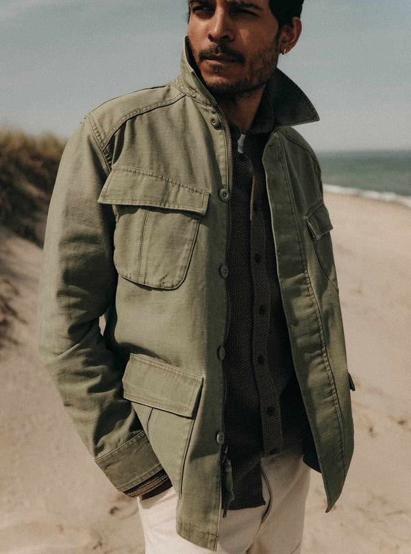 Model wearing The Surplus Jacket on the beach