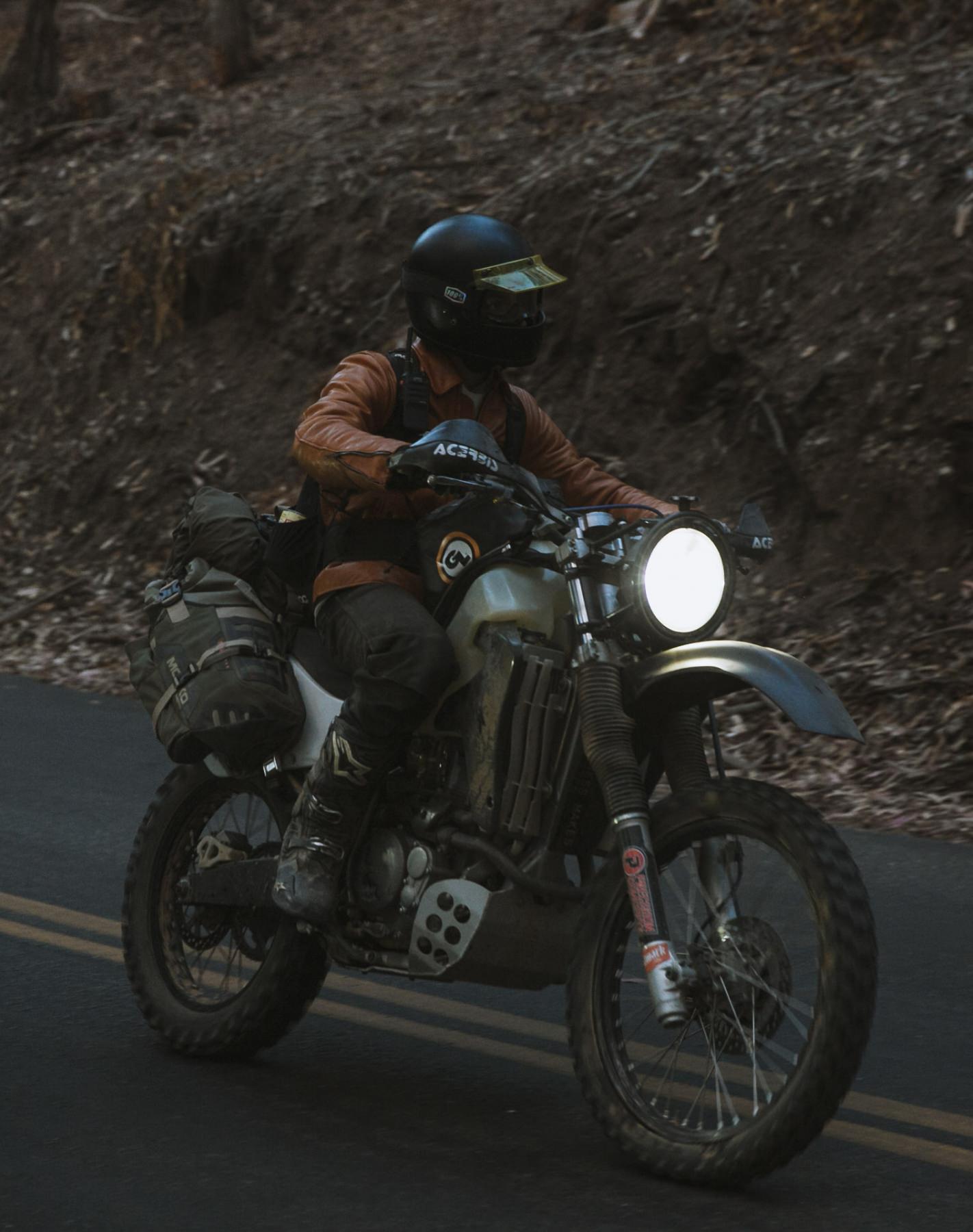 Wilderness Collective member riding at night