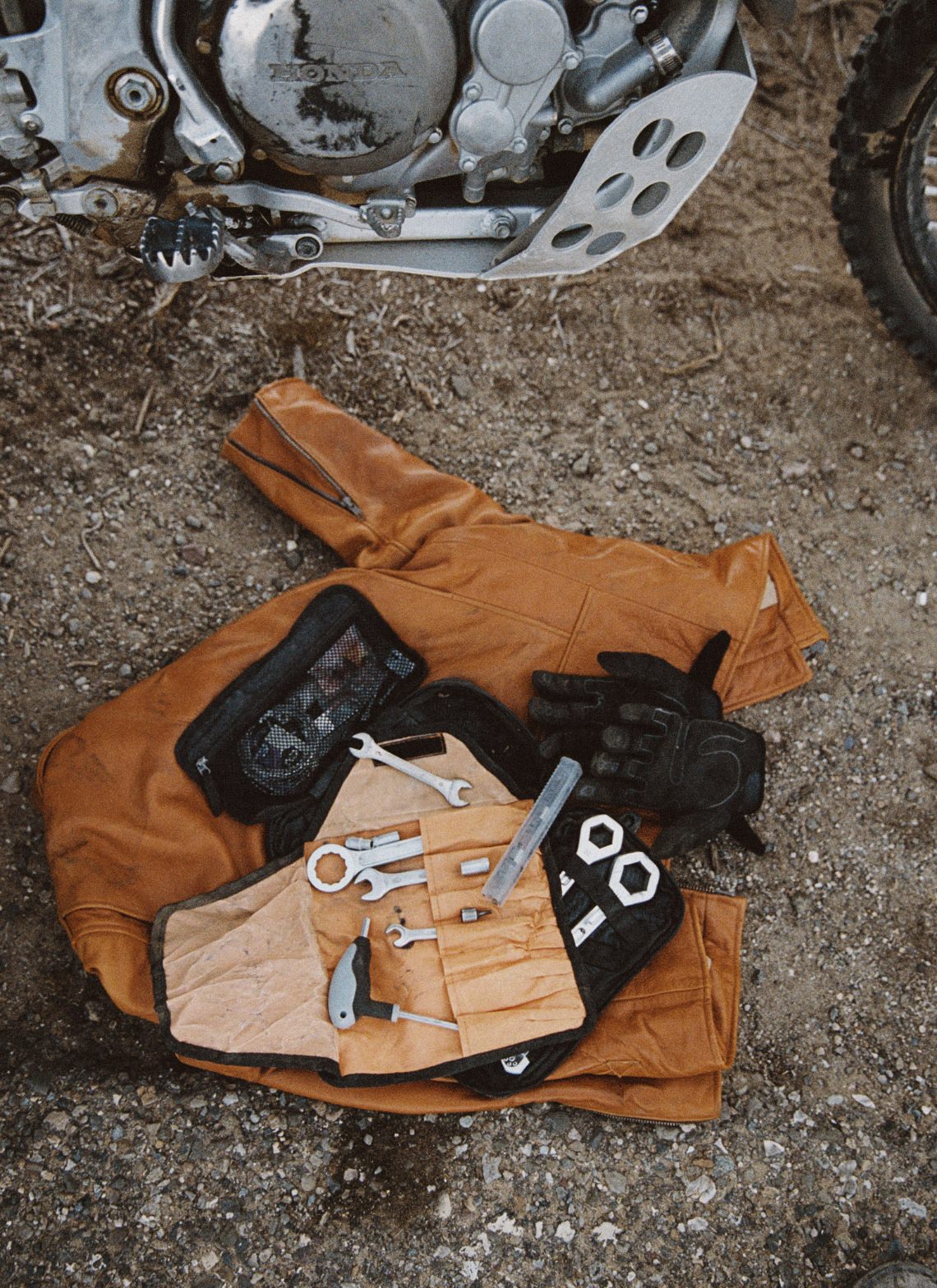 The Moto Jacket in Whiskey Steerhide with a moto kit and gloves