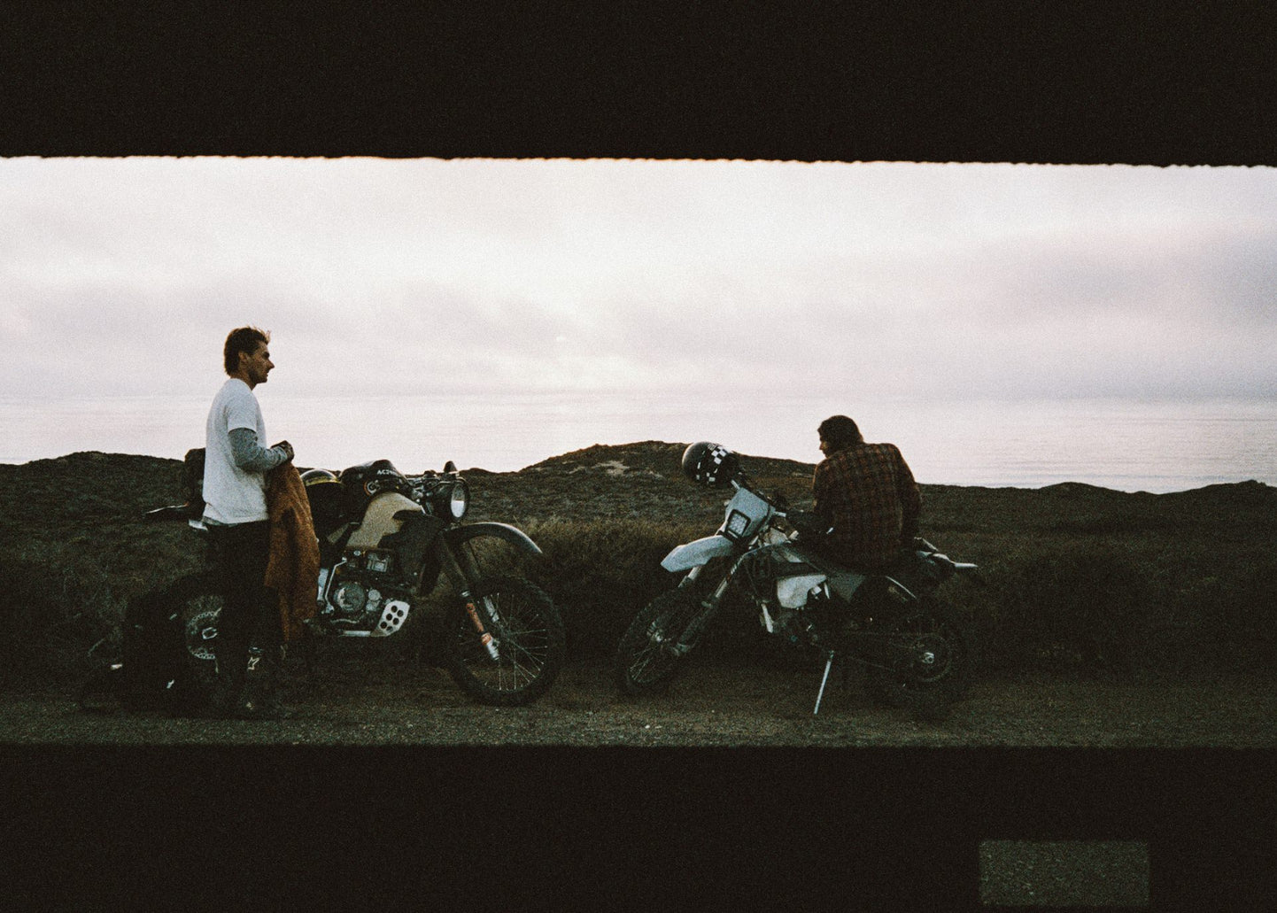 Steve Dubbeldam and another Wilderness Collective member looking out towards the sea