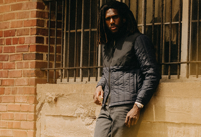 Model wearing The Ember Jacket in Dark Navy