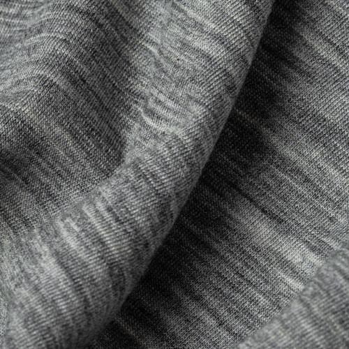 Closeup image of textured merino wool with salt and pepper coloring.